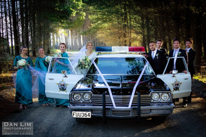 Wedding party and car.